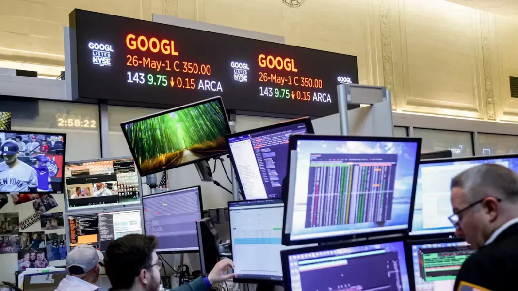 alphabet-shares-fall-record-selloff Alphabet Google headquarters stock market trading screen