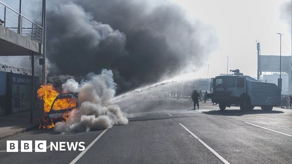 Cars torched and shops