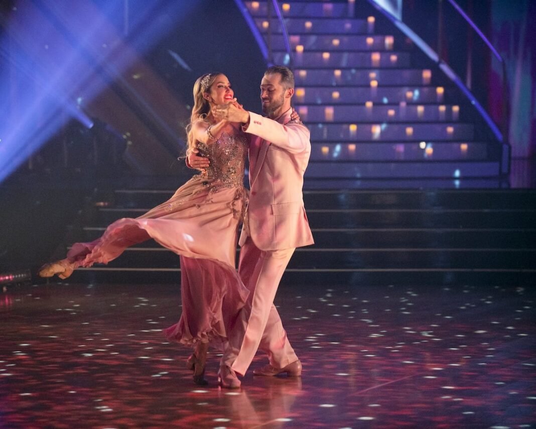 dwts-tyler-cameron-pregnancy-reveal Dancing With the Stars ballroom stage with dramatic lighting