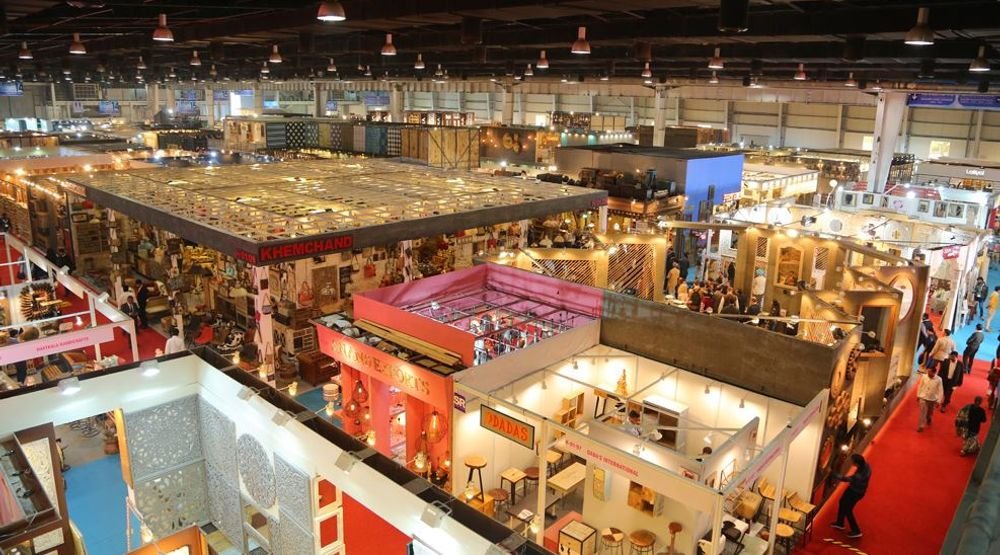 Exhibitors and buyers inside a hall at the IHGF Delhi Fair handicraft trade expo