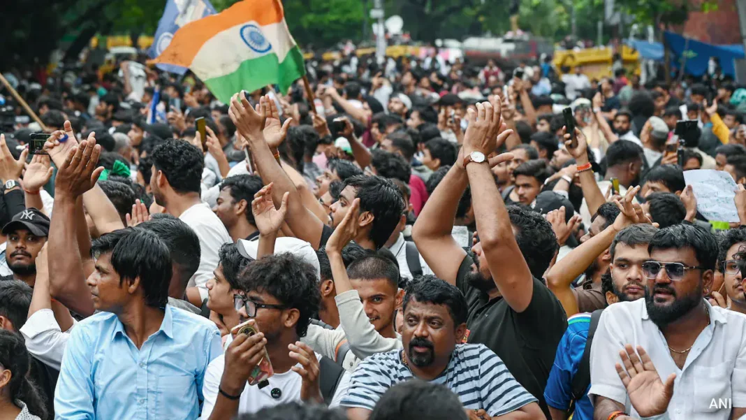 india-2026-10-21-wp-cockroach-protests-woman-harassed-modi-remarks Cockroach Janta Party youth protesters demonstrating in New Delhi