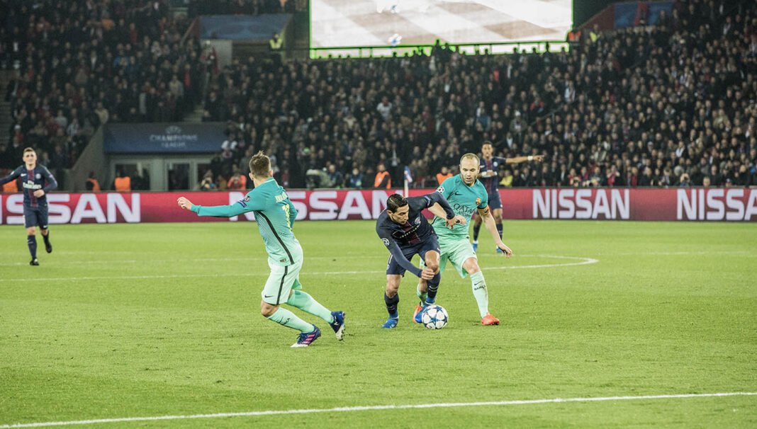 india-2026-10-21-wp-psg-vs-barcelona-4-2-champions-league-thriller Paris Saint-Germain and Barcelona players contest a Champions League match