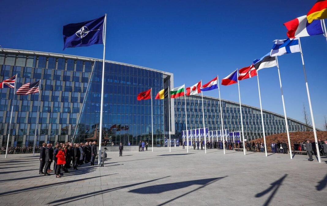 pentagon-rhetoric-warning-nato-allies-russia Pentagon building NATO flags meeting