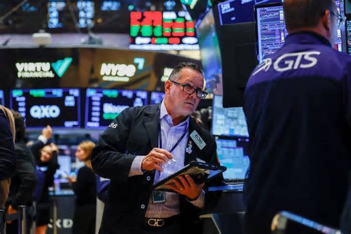 Shares slip as oil