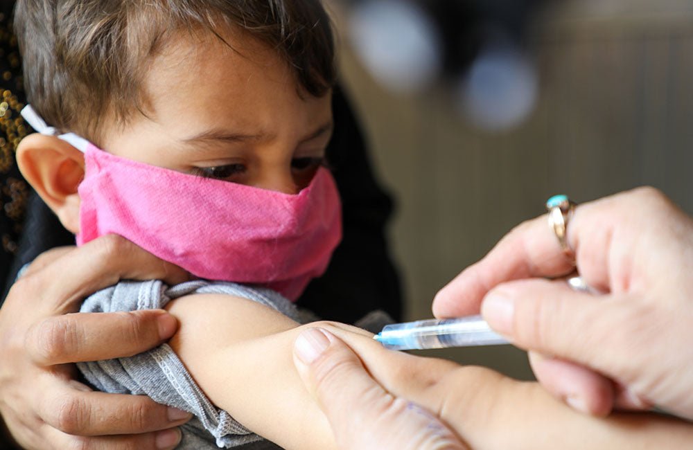 Measles vaccine vials illustrating the importance of childhood measles vaccination amid rising US cases.
