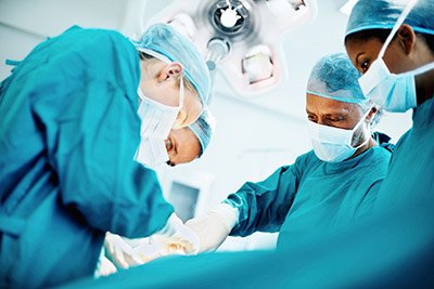 Weight loss surgery hospital illustration highlighting bariatric procedures that may lower cancer risk in obese patients.