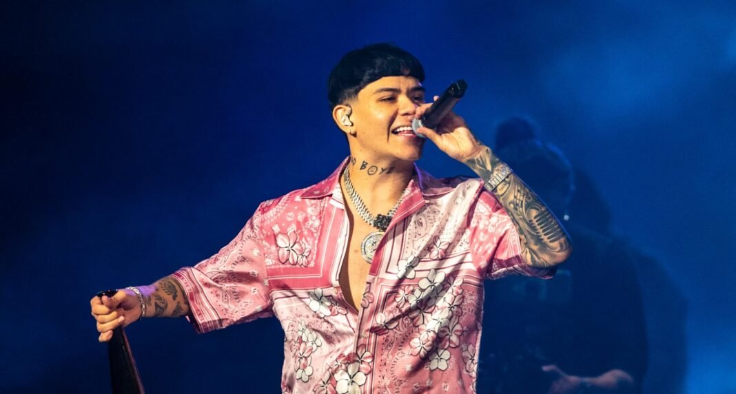 Junior H performing on stage during a concert