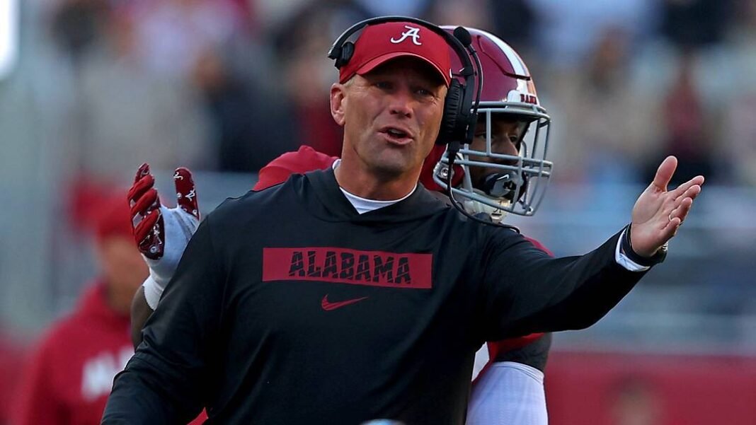 wp-alabama-tennessee-loss Alabama head coach Kalen DeBoer signaling on the sideline during a game