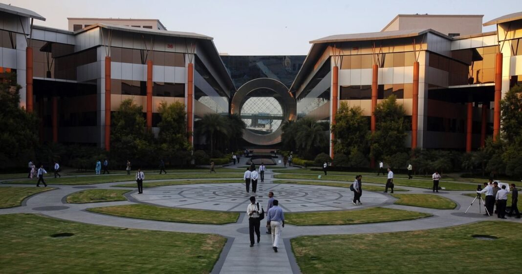 Infosys headquarters Bangalore campus, IT office employees India, artificial intelligence code screen, Bengaluru tech park buildings